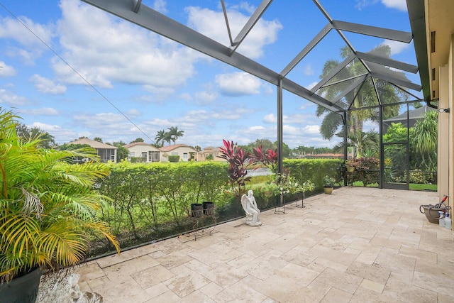 view of patio with a lanai