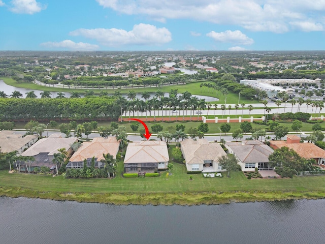 bird's eye view with a residential view and a water view