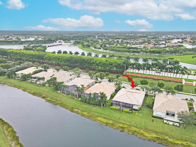 aerial view with a water view and a residential view