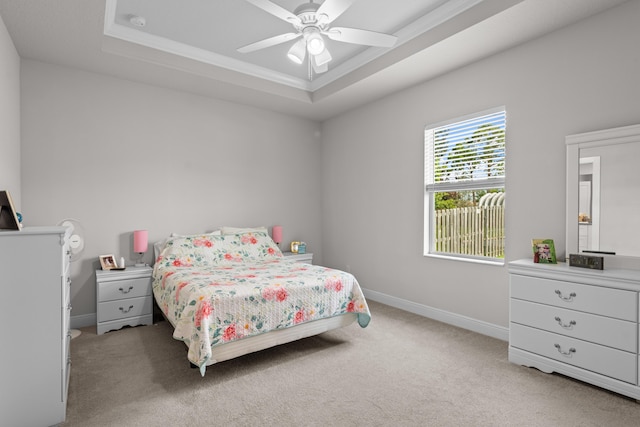 1825 SW Effland Ave, Port Saint Lucie, FL 34953 - bedroom featuring a raised ceiling, light colored carpet, baseboards, and ornamental molding