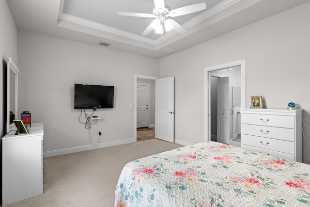 1825 SW Effland Ave, Port Saint Lucie, FL 34953 - bedroom featuring light carpet, ornamental molding, baseboards, a tray ceiling, and a ceiling fan