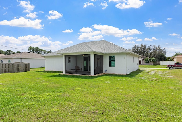 1825 SW Effland Ave, Port Saint Lucie, FL 34953 - back of property featuring a sunroom and stucco siding