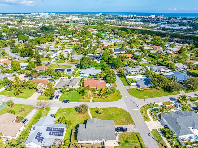 birds eye view of property with a residential view