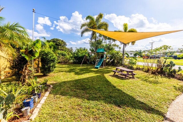 view of yard with a playground