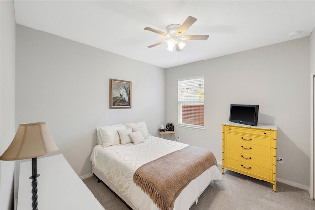 bedroom featuring ceiling fan and carpet flooring