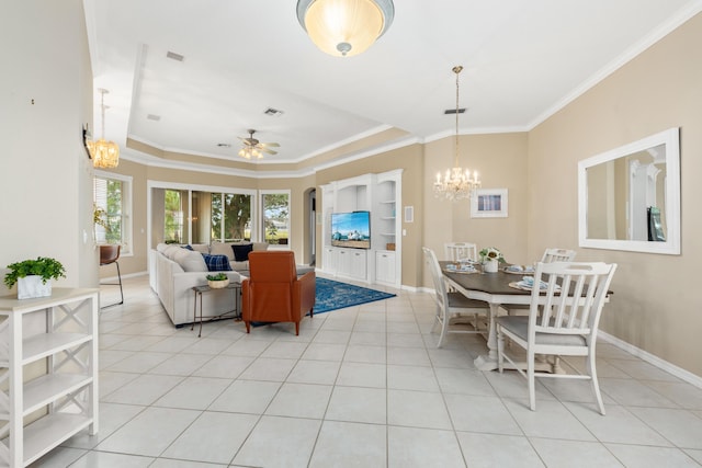 living room featuring ceiling fan with notable chandelier, crown molding, and light tile patterned floors