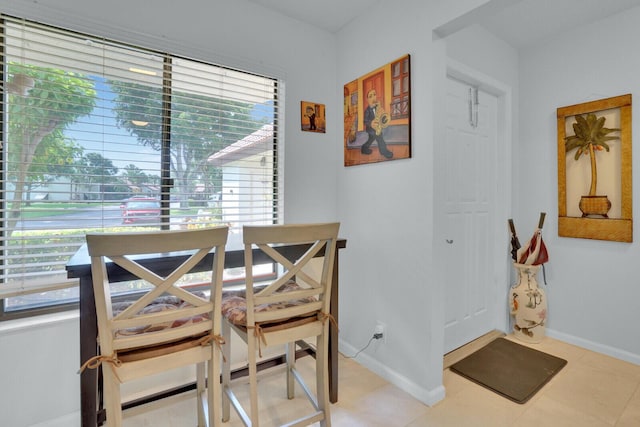 dining space with baseboards