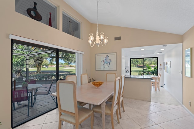 dining area with a notable chandelier, light tile patterned flooring, visible vents, and a healthy amount of sunlight