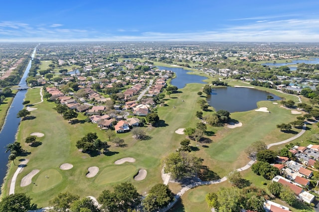 bird's eye view with golf course view and a water view