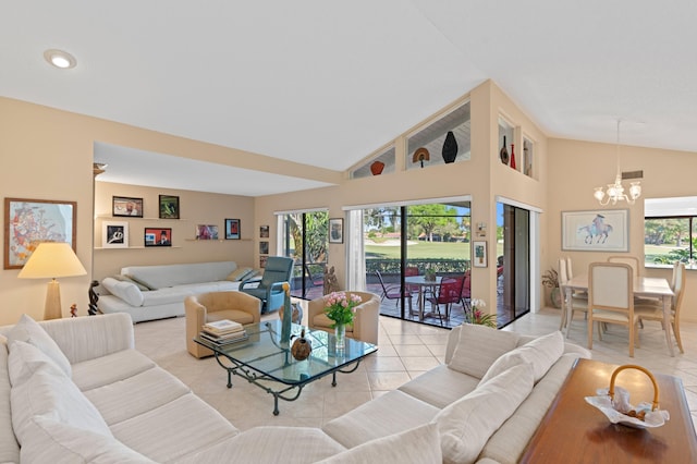 living area with high vaulted ceiling, a notable chandelier, and light tile patterned flooring