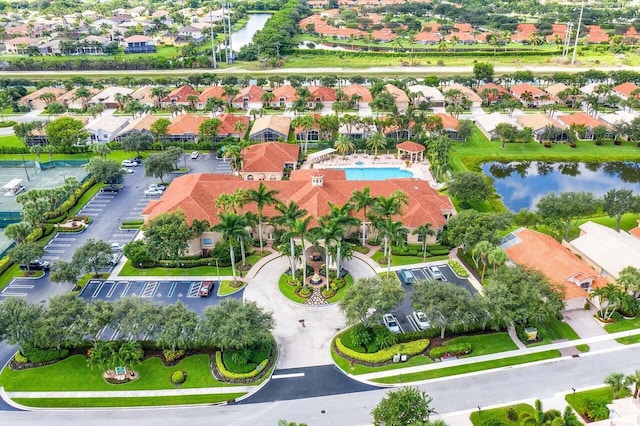 aerial view featuring a water view and a residential view