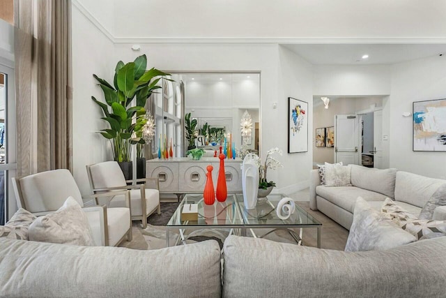 living room featuring recessed lighting and baseboards