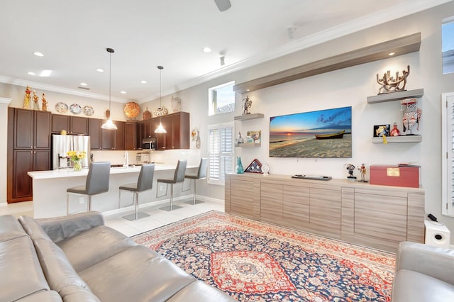 living room with light tile patterned floors, baseboards, crown molding, and recessed lighting