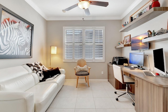 home office with ornamental molding, a ceiling fan, baseboards, and light tile patterned floors