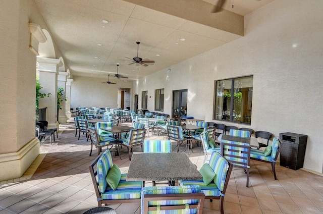 view of patio / terrace with ceiling fan and outdoor dining space