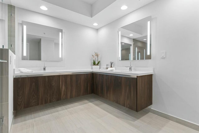 1180 N Federal Hwy Unit 1409, Fort Lauderdale, FL 33304 - bathroom featuring a sink, recessed lighting, and double vanity
