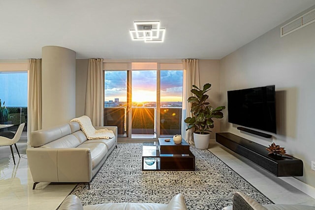 1180 N Federal Hwy Unit 1409, Fort Lauderdale, FL 33304 - living area with visible vents and a wealth of natural light