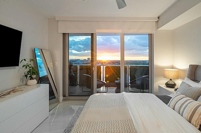 1180 N Federal Hwy Unit 1409, Fort Lauderdale, FL 33304 - bedroom with access to exterior and a ceiling fan