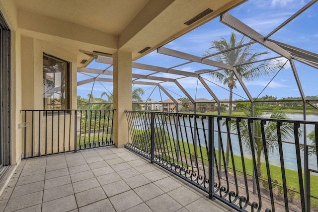 balcony featuring a water view