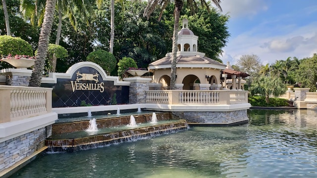 view of home's community with a water view