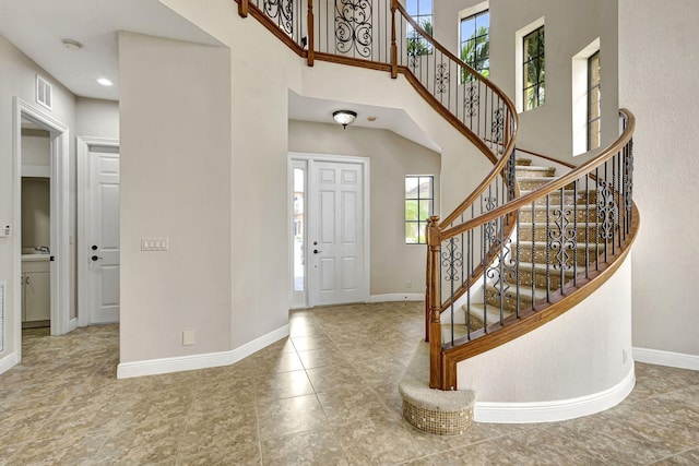 entrance foyer with a towering ceiling