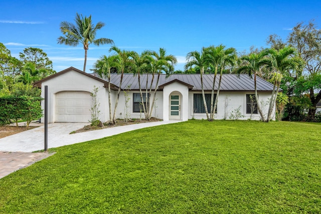 ranch-style home featuring a front yard and a garage