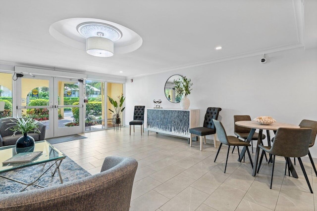 dining area with ornamental molding, recessed lighting, and french doors