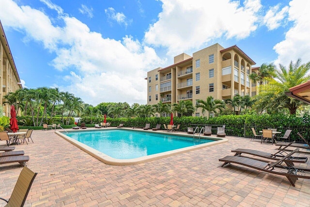 pool with a patio area