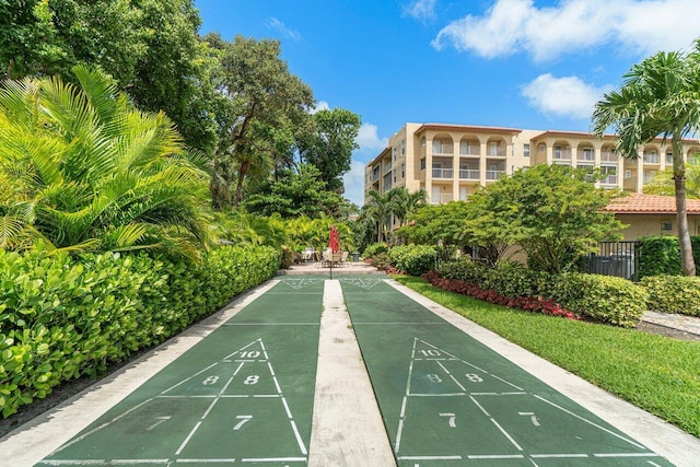 view of property's community with shuffleboard