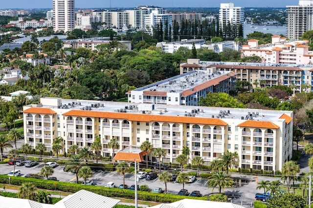 birds eye view of property with a city view