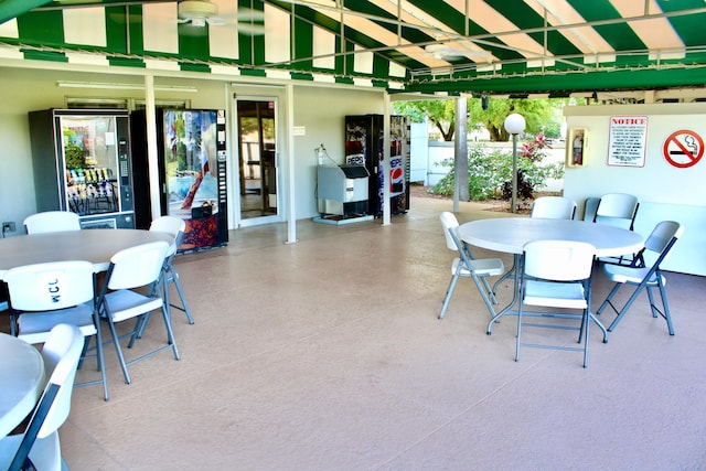 view of patio / terrace with outdoor dining area and fence