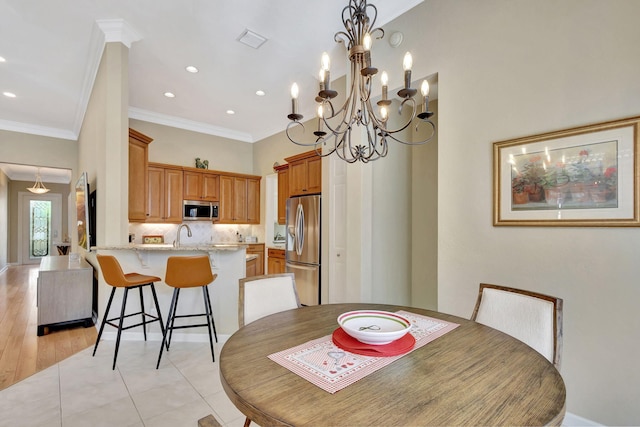 dining space with ornamental molding, visible vents, light tile patterned floors, and recessed lighting