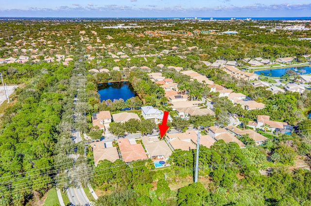 birds eye view of property featuring a residential view and a water view