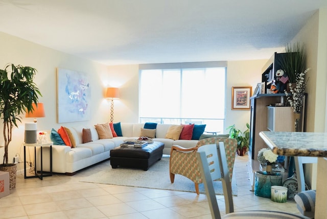 living room with light tile patterned floors