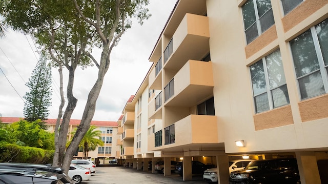 view of property with covered parking