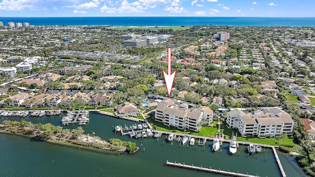 aerial view with a residential view and a water view