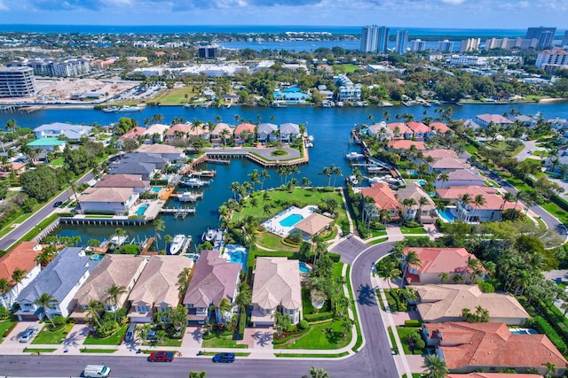 aerial view featuring a residential view and a water view