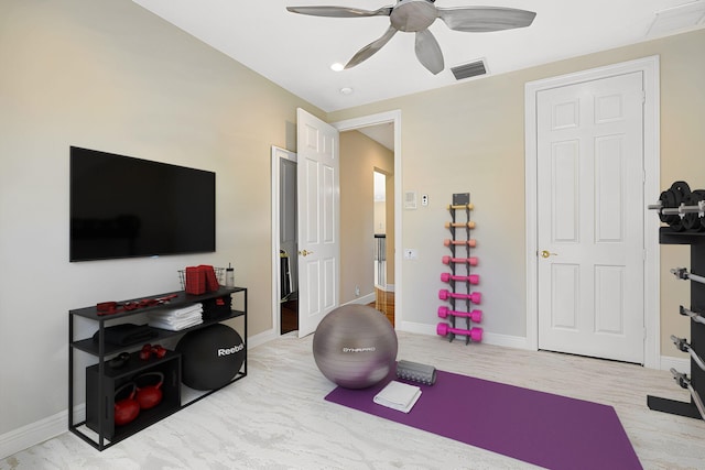 workout room with ceiling fan, visible vents, and baseboards