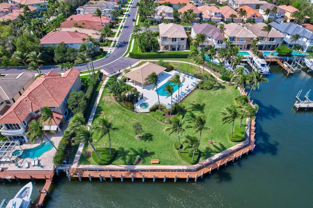 aerial view featuring a residential view and a water view