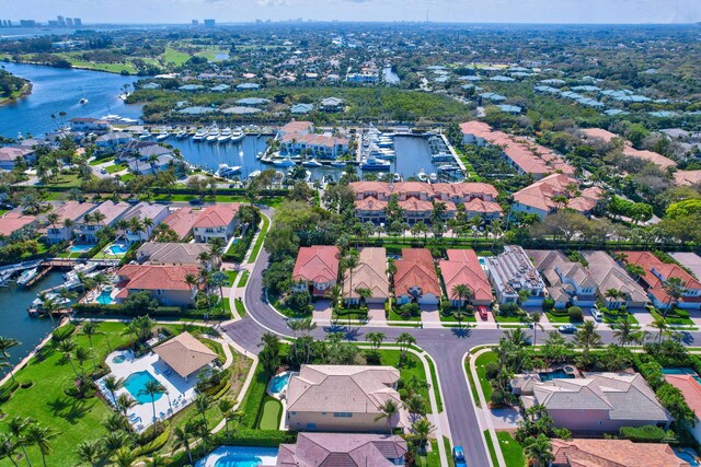 aerial view with a residential view and a water view