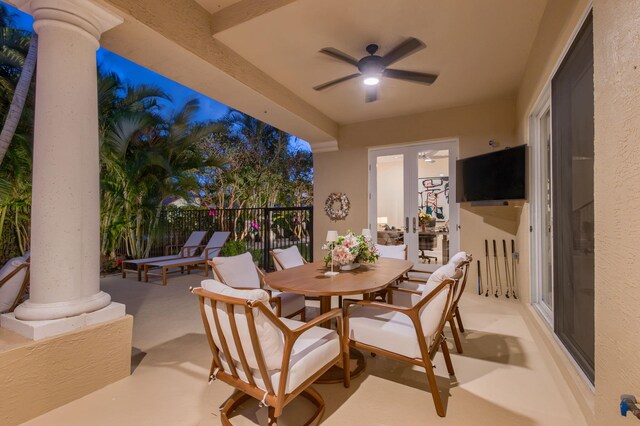 view of swimming pool featuring a patio area, a fenced in pool, outdoor dining area, and a ceiling fan