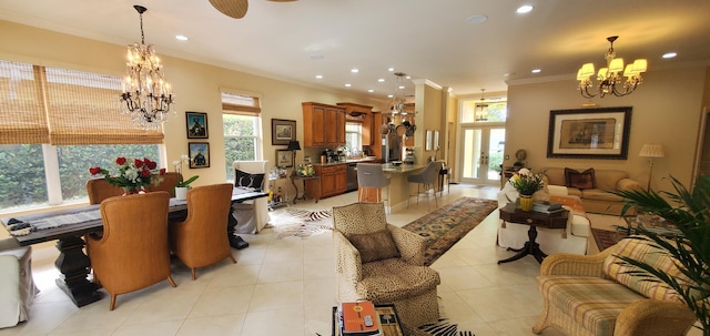 interior space with a chandelier, light tile patterned floors, and ornamental molding