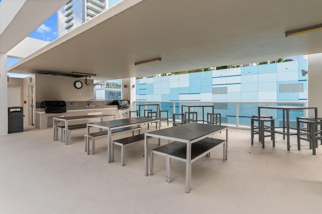 view of patio featuring outdoor dining area