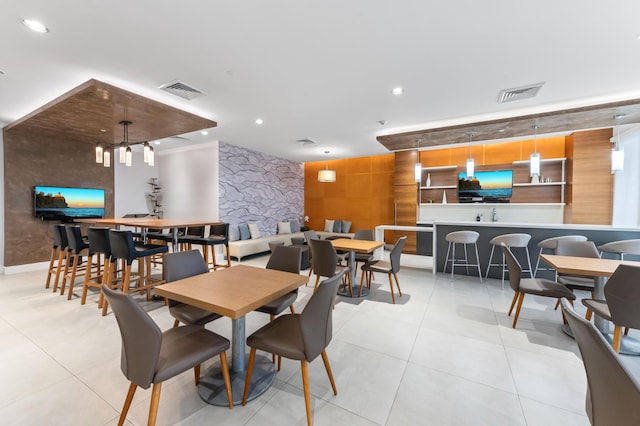 dining area with recessed lighting, visible vents, and light tile patterned floors