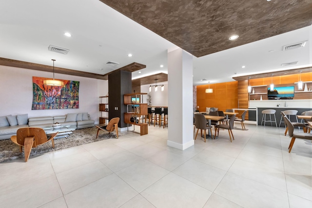 living room with recessed lighting and visible vents