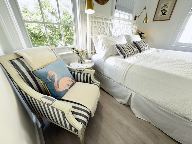 bedroom with wood finished floors