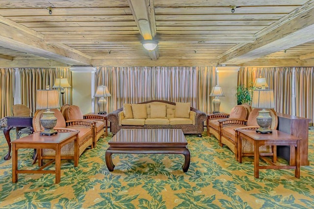 interior space featuring beam ceiling, carpet flooring, and wooden ceiling