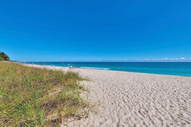 property view of water with a beach view