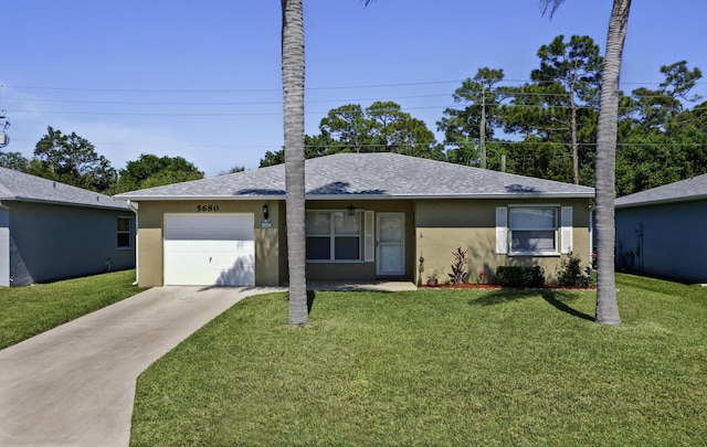 ranch-style house featuring a front yard, a garage, driveway, and stucco siding