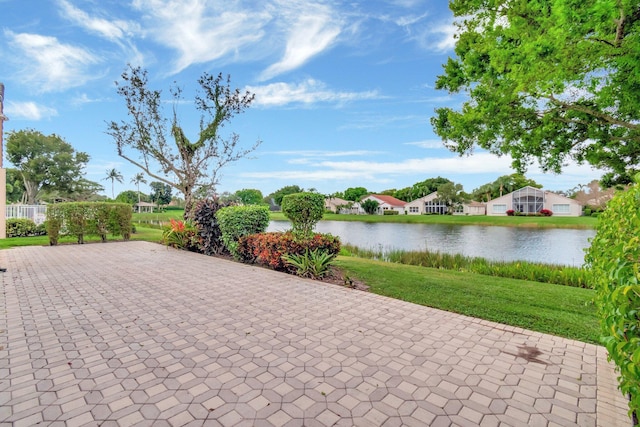 view of patio featuring a water view